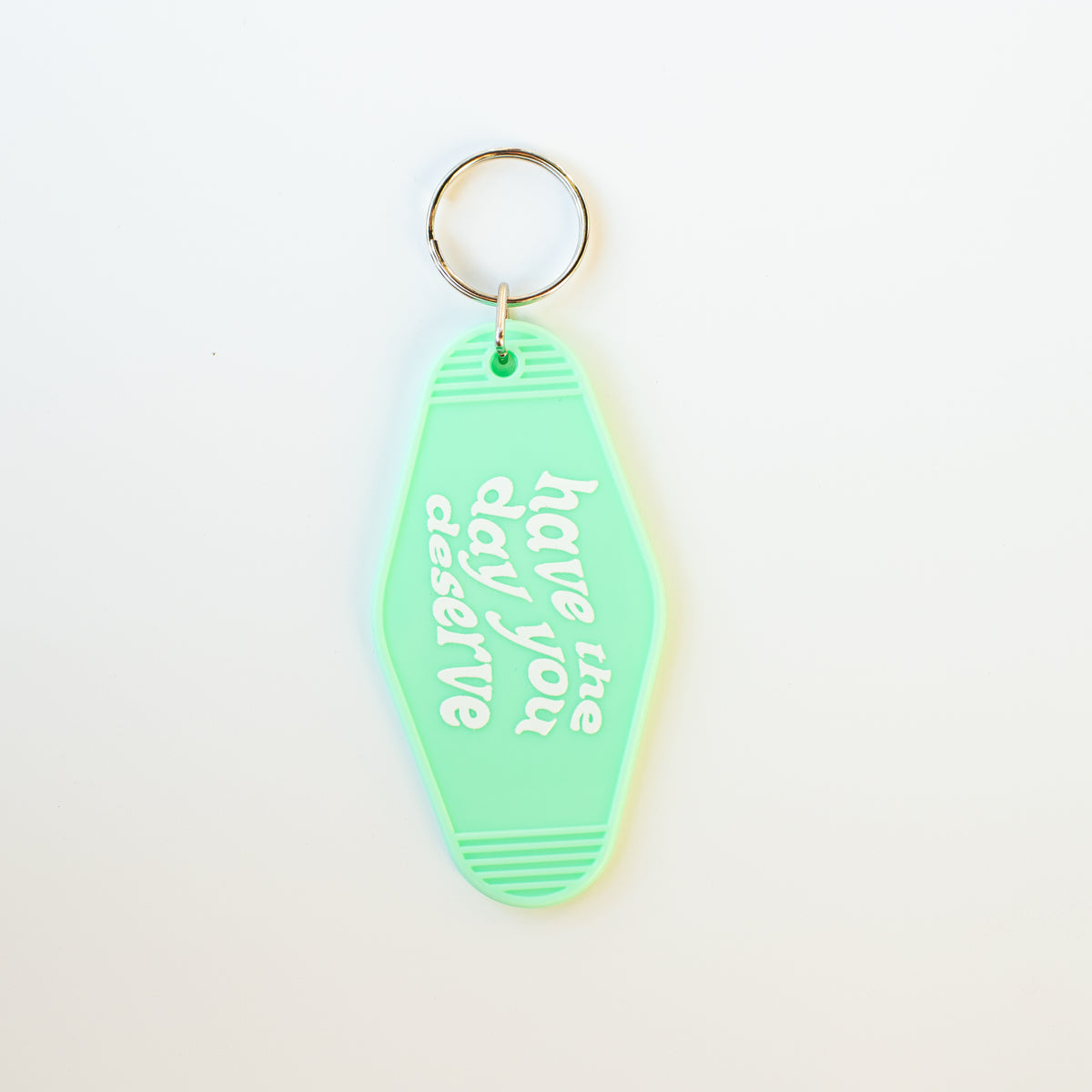 Have the Day You Deserve Motel Keychain